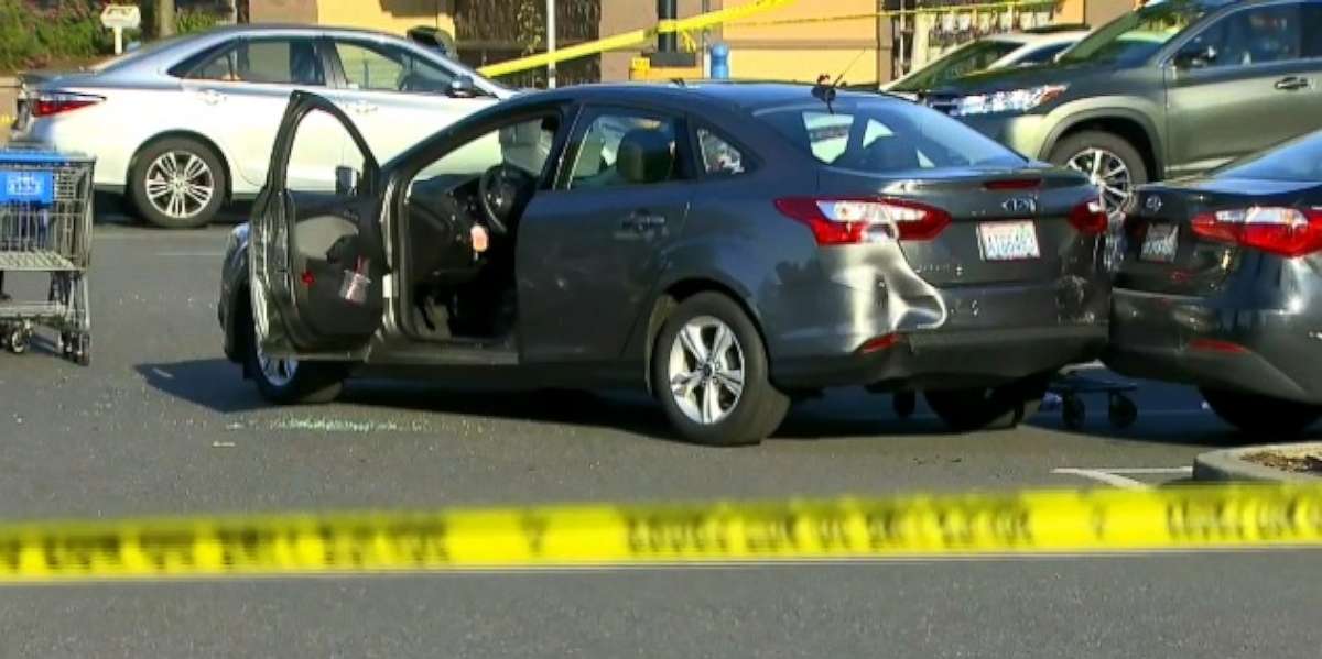 Police investigate an attempted carjacking at a Walmart in Tumwater, Washington.