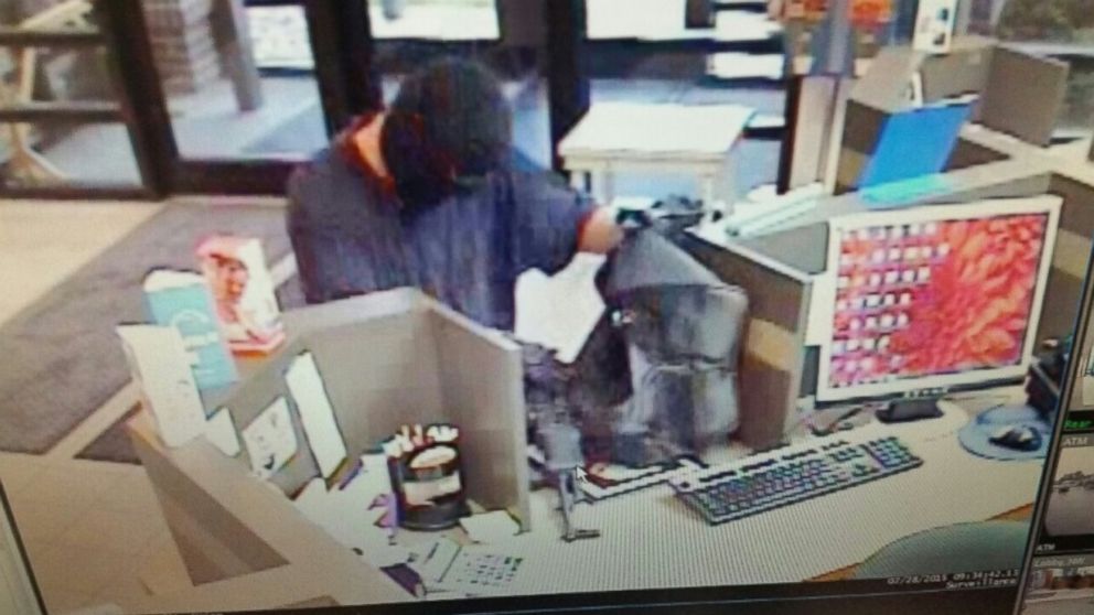 PHOTO: The FBI released photos of a man dubbed the "AK-47 Bandit" as he robbed a credit union in Mason City, Iowa, July 28, 2015.