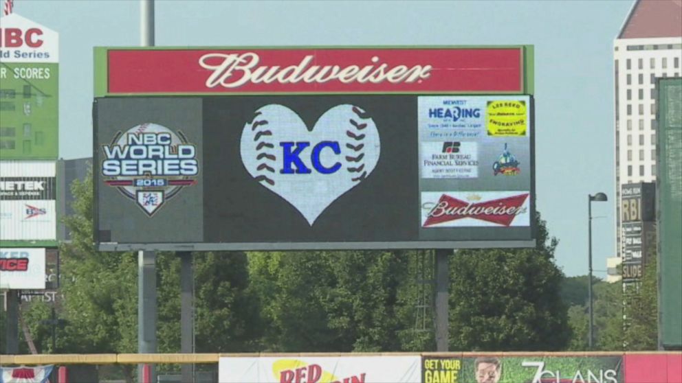 PHOTO:The Liberal Bee Jays pay tribute to their batboy, Kaiser Carlile, in Wichita, Kan. 