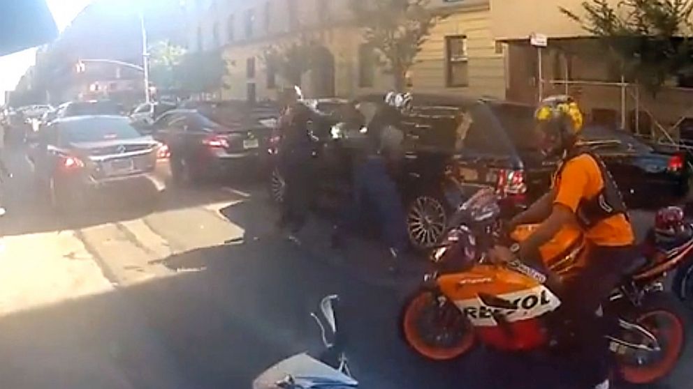 Daphne Avalon posted video, "Black Range Rover Runs Over Bikers in NYC," on YouTube showing a biker and car chase ending in bikers' smashing the driver's window and allegedly assaulting him. 
