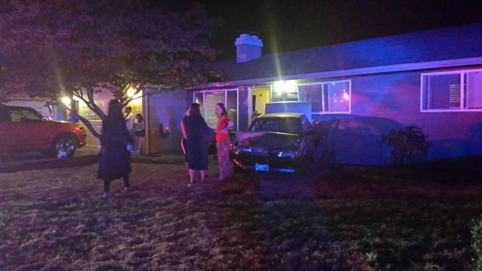 PHOTO: Amanda Davis took this photo on July 18, 2015, after a driver pushed her daughter's car into her neighbor's house.