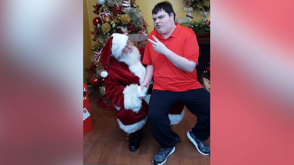 Casey Hackett, 22, was captured on video this past Saturday sitting on Santa's lap and chatting with Mr. Claus about everything from reindeer to dinosaurs and what he wanted for Christmas. Meria Hackett, Casey's mother, posted the video with a thank you note to Santa on Facebook.