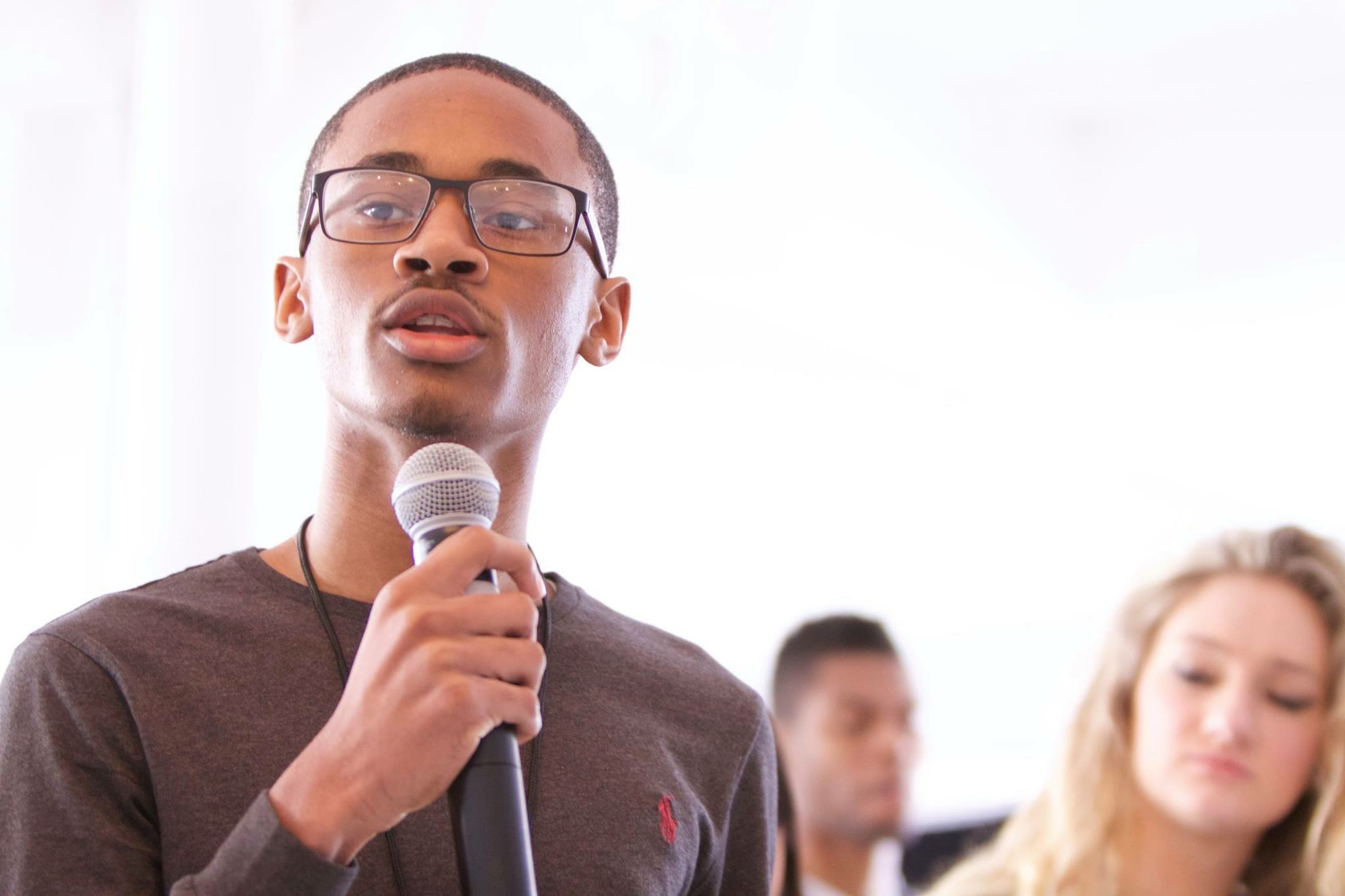 PHOTO: Chris Suggs, 15, speaks at the Global Teen Leaders/Three Dot Dash conference.