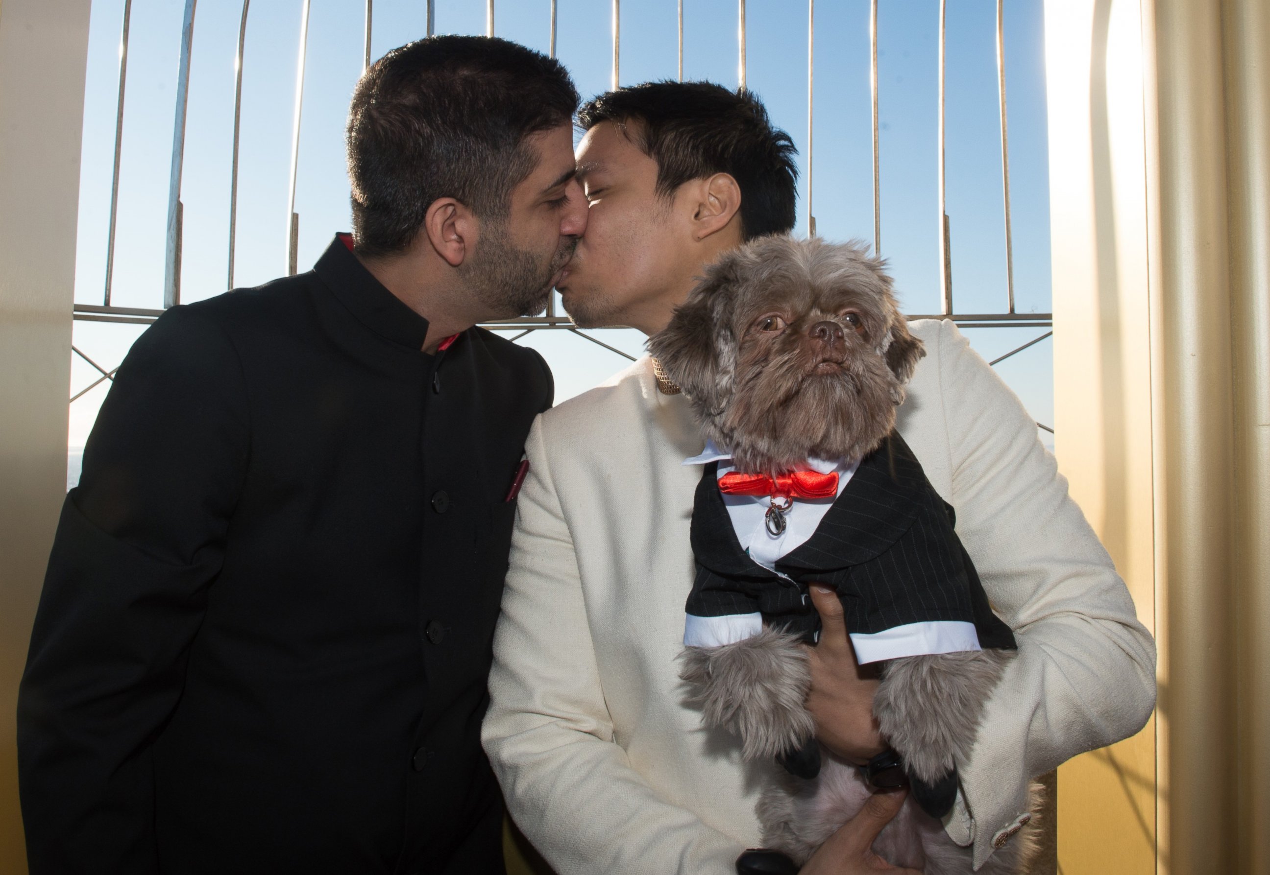 PHOTO: Vijay Lalwani and Hector Jerome Bondoc of New York, NY are married as the Empire State Building hosts Valentine's Day Weddings, Feb. 14, 2016.
