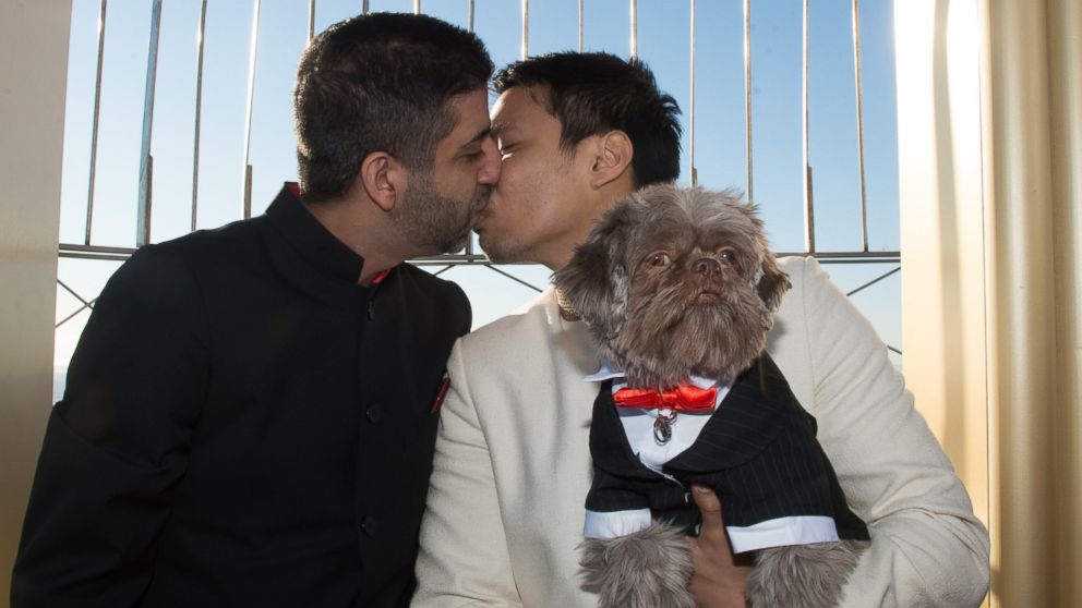 PHOTO: Vijay Lalwani and Hector Jerome Bondoc of New York, NY are married as the Empire State Building hosts Valentine's Day Weddings, Feb. 14, 2016.