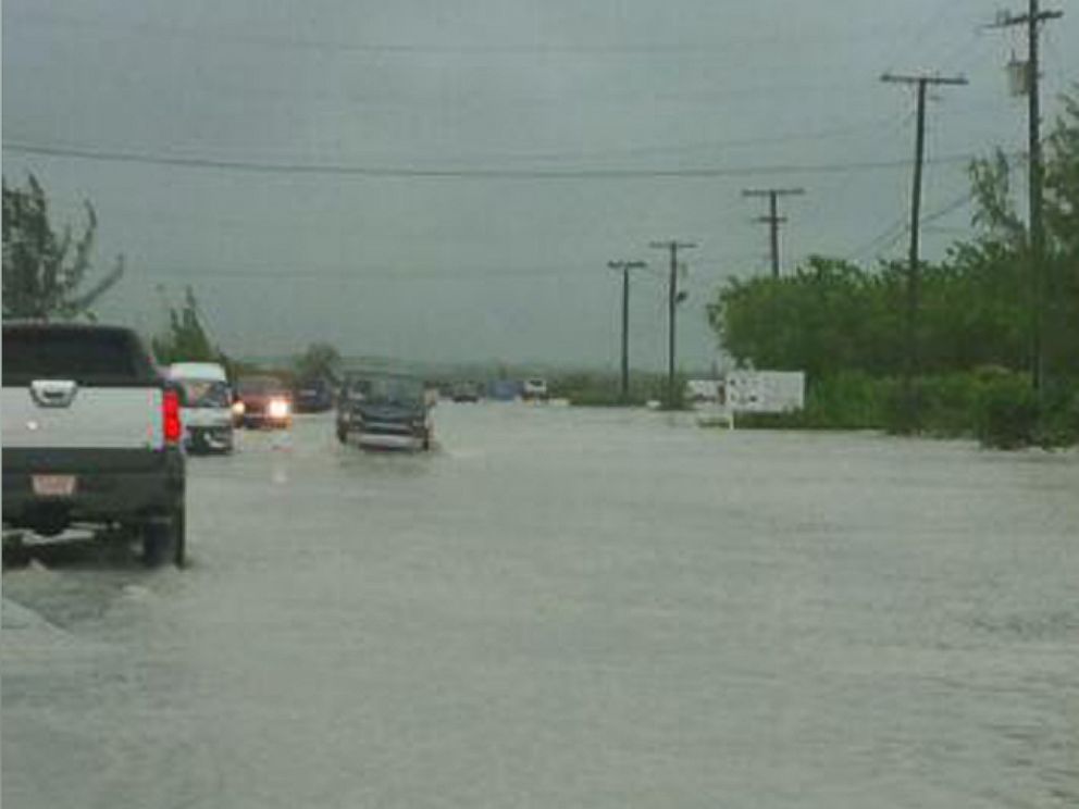 PHOTO: Heavy rain from Tropical Storm Cristobal brings flooding to The Turks and Caicos.