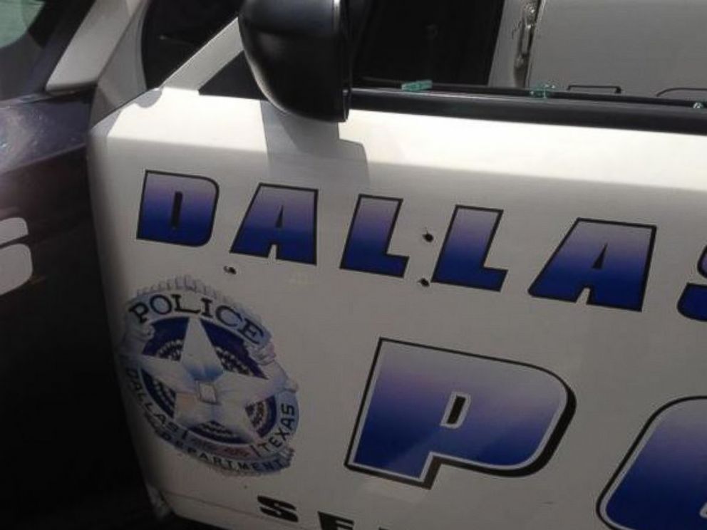 PHOTO: This photo, provided by the Dallas Police Department, shows the damage to a police squad car after a shooting on June 13, 2015.