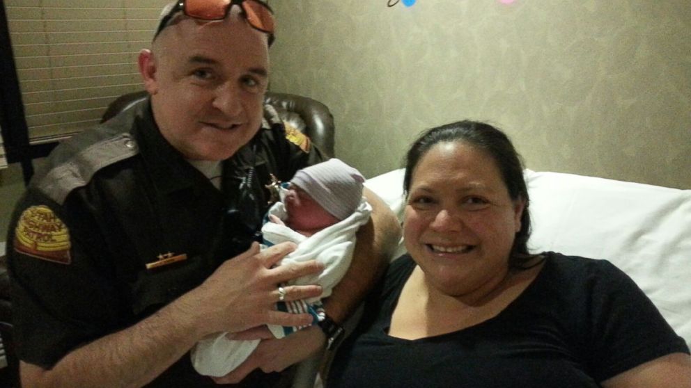Utah woman Devi Ostler gave birth to a healthy baby boy on the side of the highway with the assistance of Trooper Carr.