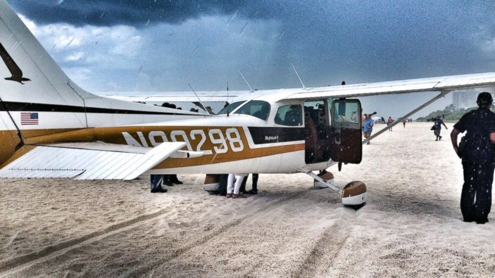 Miami Beach Police tweeted this photo, July 29, 2014, with the text, "#Plane makes emergency landing on beach right before storm.Pilot & 3 passengers safe. No injuries mechanical failure."