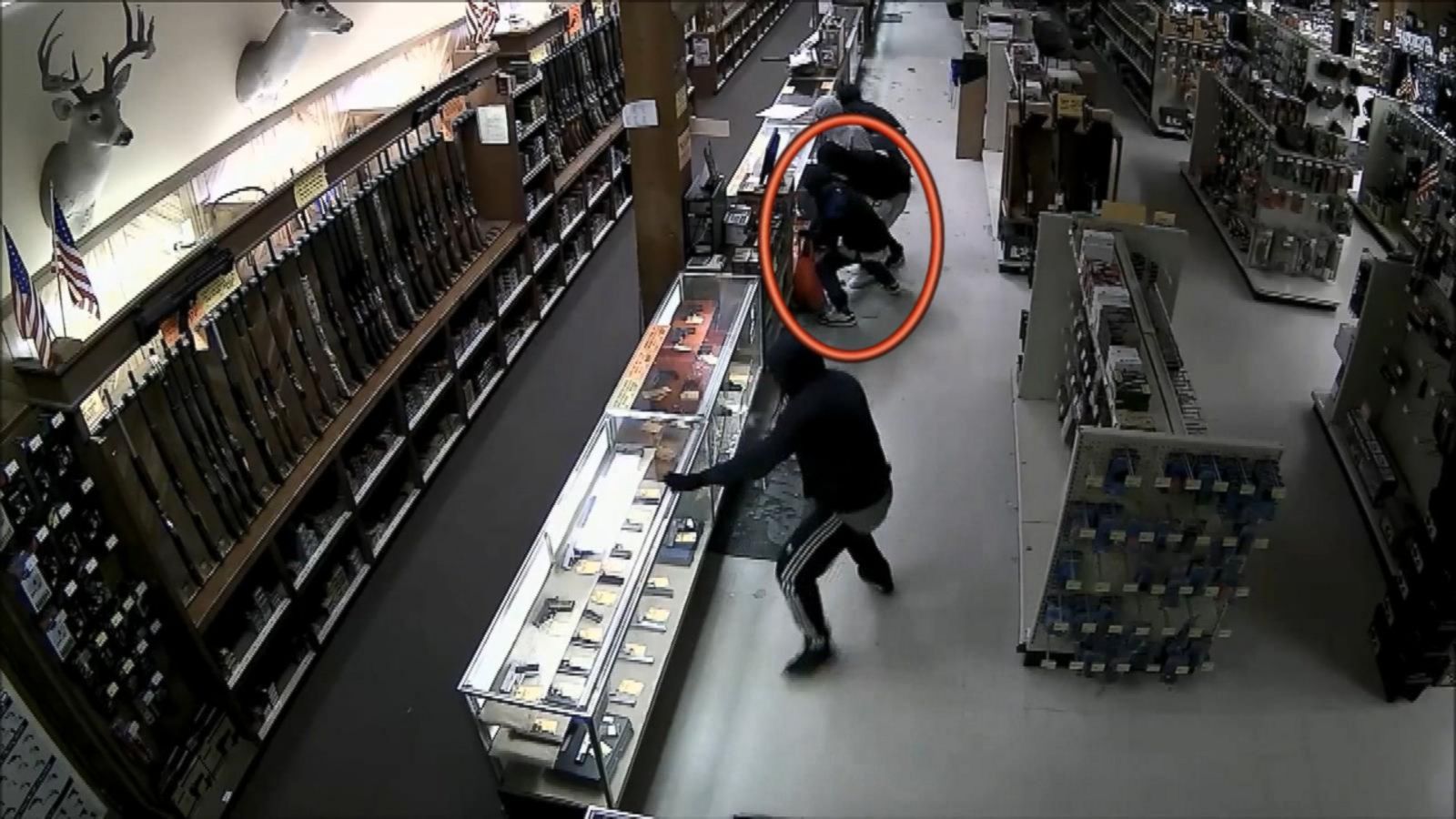 CCTV Footage Shows Customer Stealing Gunman's Loot During Armed Robbery