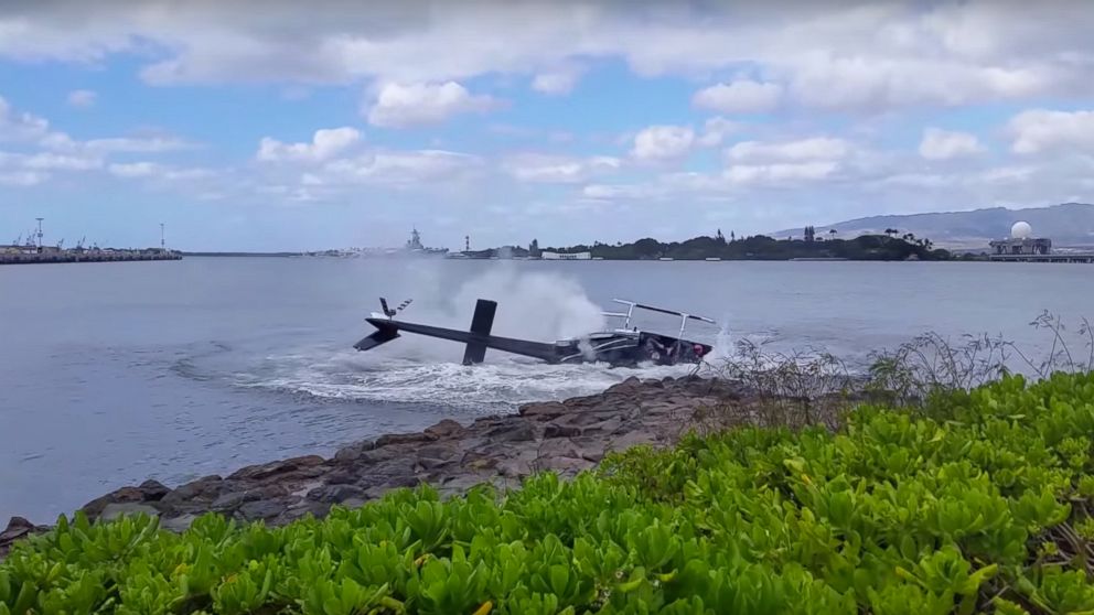 PHOTO: A helicopter crashed near the USS Arizona memorial, Feb. 18, 2016, in Pearl Harbor, Hawaii. 