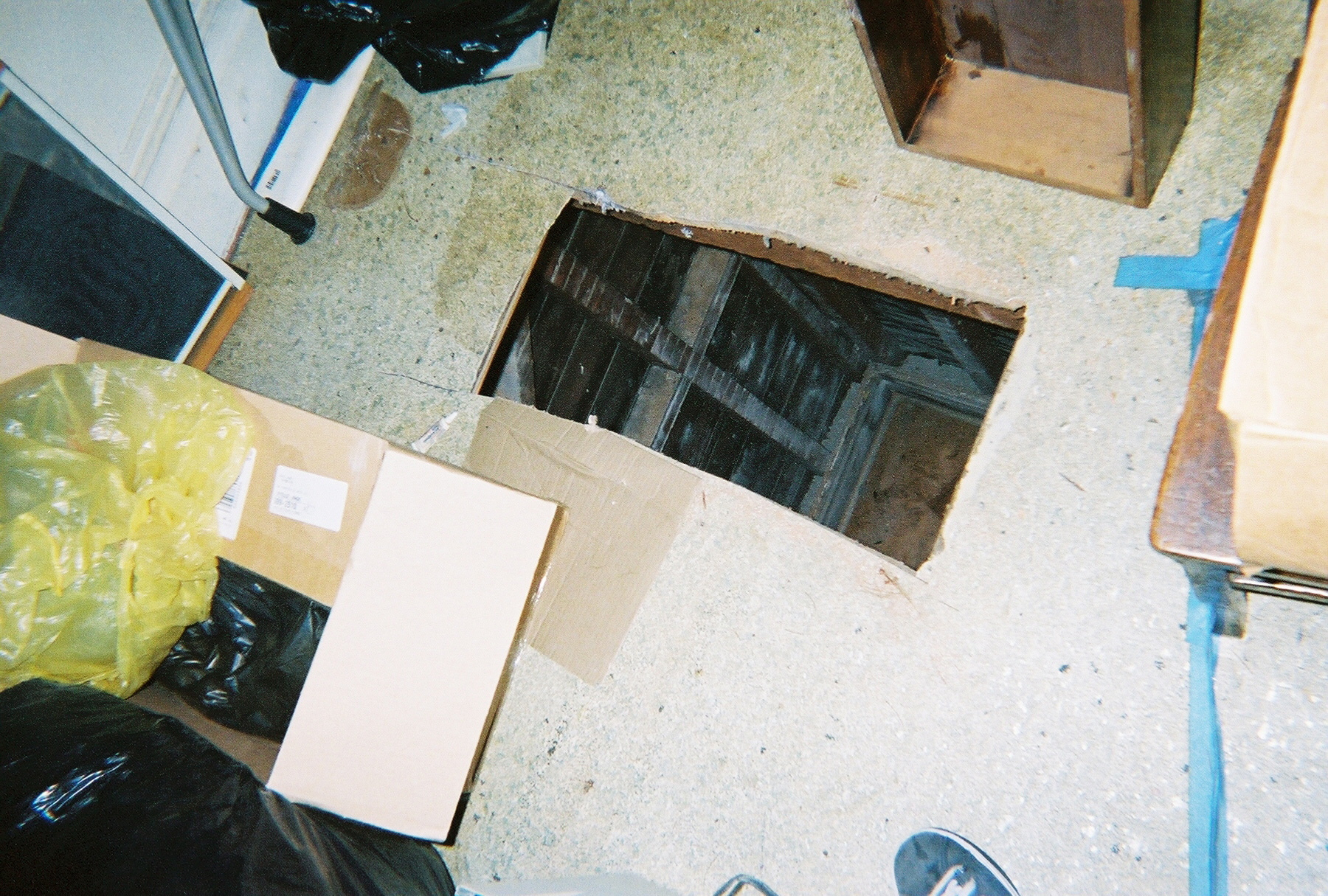 PHOTO: Kip and Nicole Macy cut this hole through the floor of their tenant's apartment with a saw. 