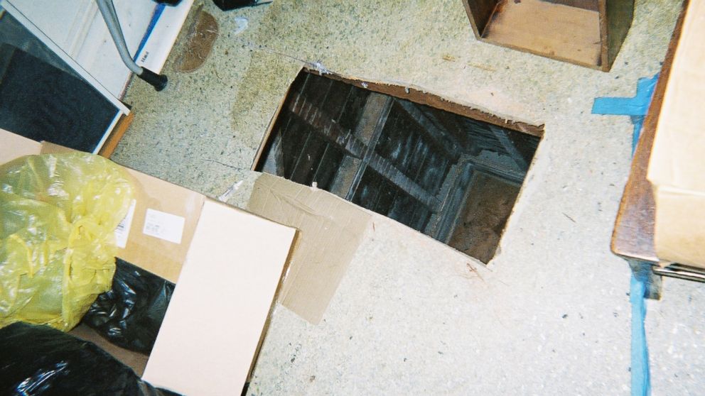 PHOTO: Kip and Nicole Macy cut this hole through the floor of their tenant's apartment with a saw.