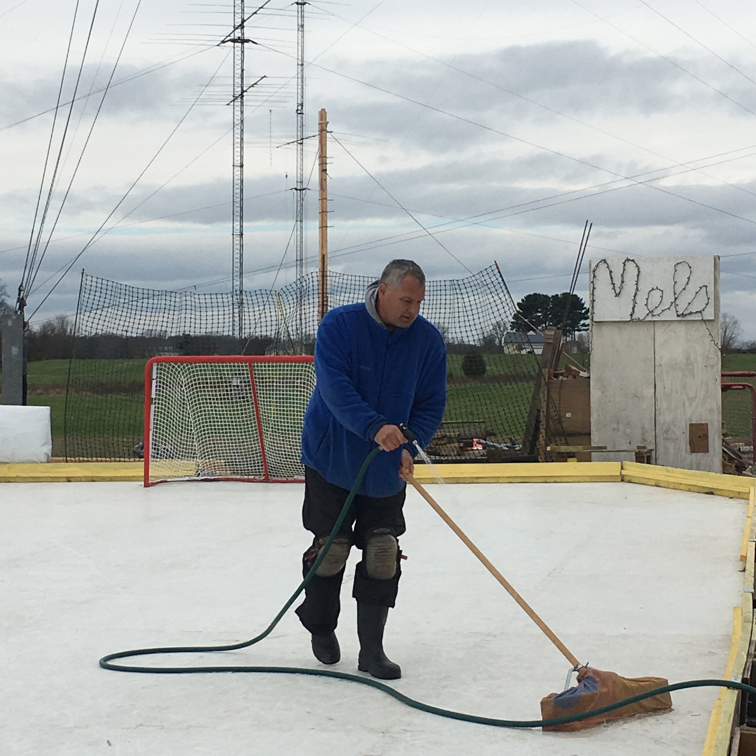 PHOTO:Maryland resident Marc Kohn maintains his hockey rink on January 1 2016 that he built in his backyard in memory of his stepdaughter Melanie Osborne. 
 