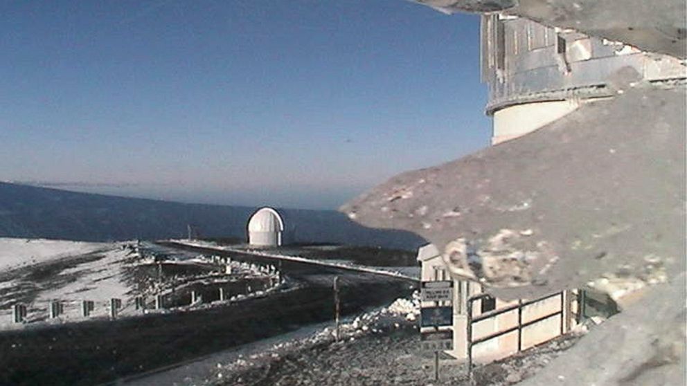 The web cameras at the Mauna Kea Weather Center in Hawaii have recorded a snow fall in the early morning, Dec. 25, 2014.