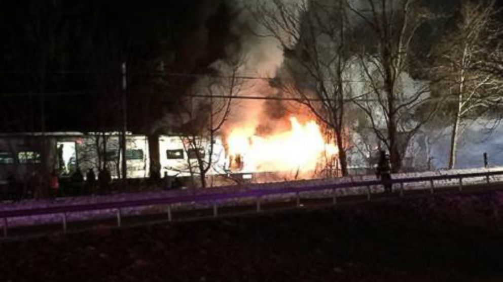 PHOTO: A Metro North train struck a car, sparking a fire, north of White Plains, N.Y., Feb. 3, 2015.