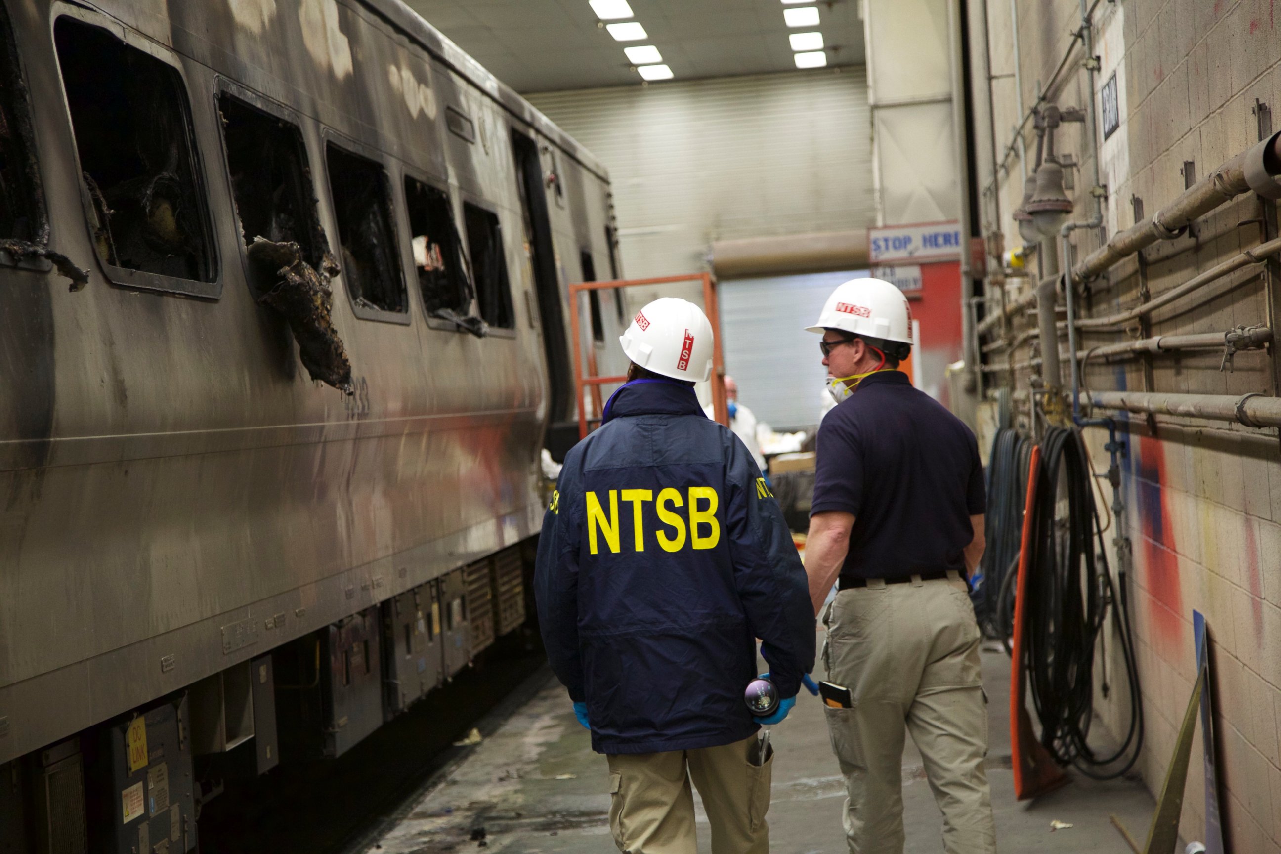 PHOTO: This photo posted to Flickr by the National Transportation Safety Board shows the damaged train involved in a Metro-North accident at a maintenance facility to be further examined, Feb. 4, 2015.
