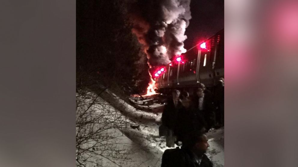 PHOTO: Passengers being evacuated from a Metro North train after it struck a car, sparking a fire, north of White Plains, N.Y., Feb. 3, 2015.
