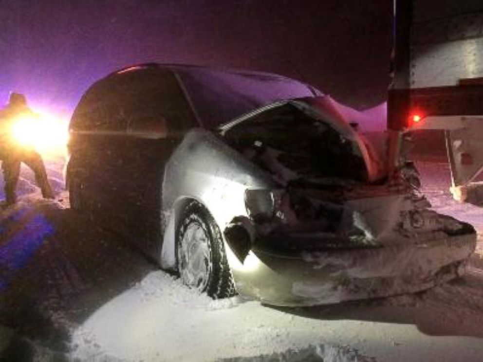 PHOTO: The truck driver didn't realize a minivan was attached to his truck, so he drove for a reported 16 miles. 