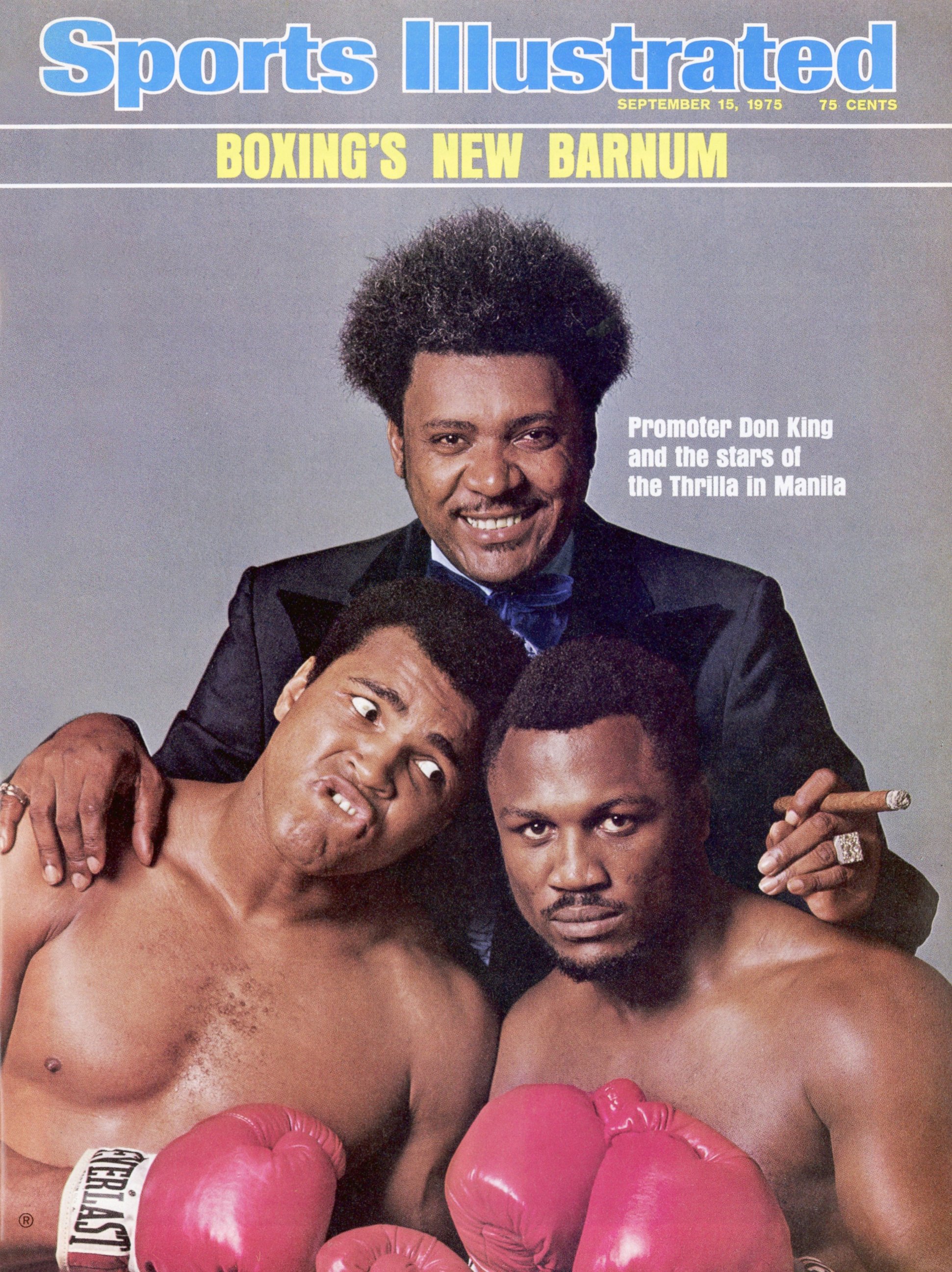 PHOTO: Promoter Don King with heavyweights Muhammad Ali and Joe Frazier on the September 15, 1975 cover of Sports Illustrated.