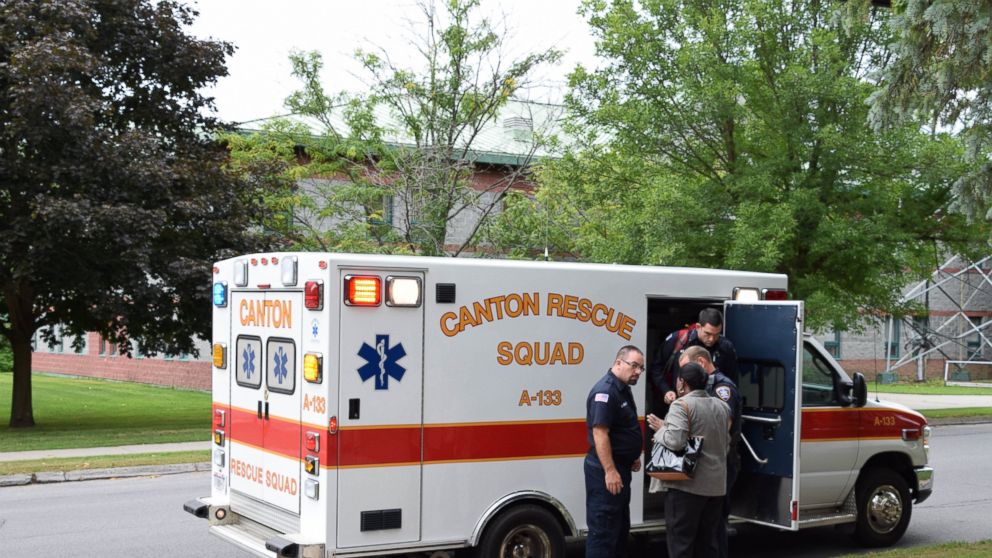 An ambulance is seen outside of the St. Lawrence County Courthouse in Canton, New York.