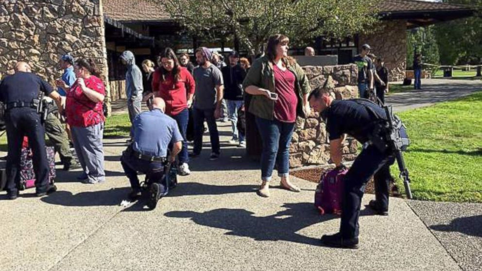 PHOTO: Paramedics tend to injuries after being called to an active shooter at Umpqua Community College in Roseburg, Oregon, Oct. 1, 2015.