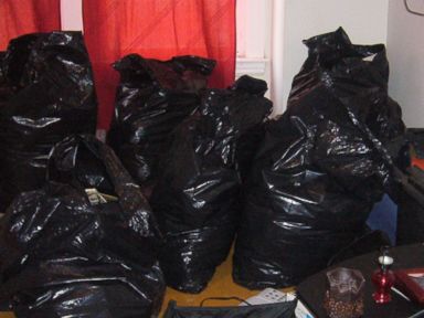 PHOTO: The belongings of several tenants were placed in these trash bags by their landlords, Kip and Nicole Macy, authorities said.