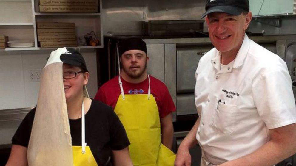 PHOTO: Walter Gloshinski trains employees with developmental disabilities at Smiling With Hope Pizza in Reno, Nevada.