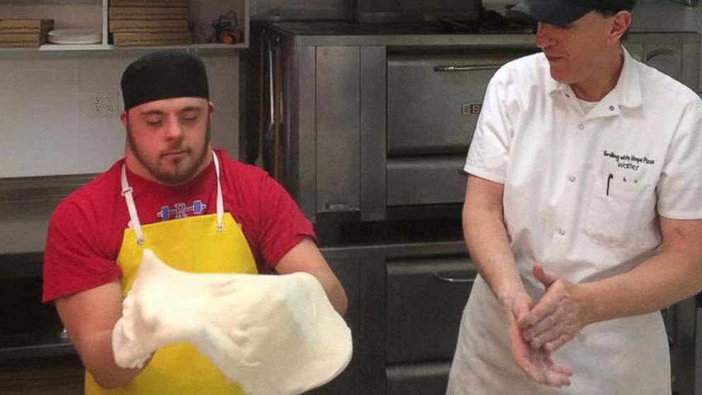 Walter Gloshinski trains employees with developmental disabilities at Smiling With Hope Pizza in Reno, Nevada.