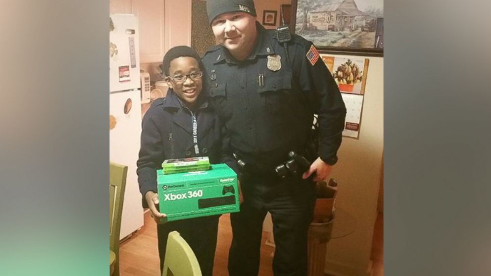 Four Memphis Police Department officers surprised an 11-year-old boy with a new Xbox on Nov. 30, 2015 after his home had been burglarized.