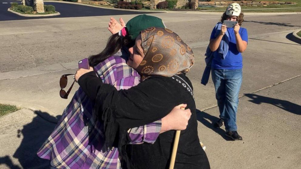 PHOTO: An anti-Muslim protester who identified herself only as "Annie" at Noor Islamic Cultural Center in Columbus, Ohio recently had a change of heart after being met by a welcoming group from the center. 
