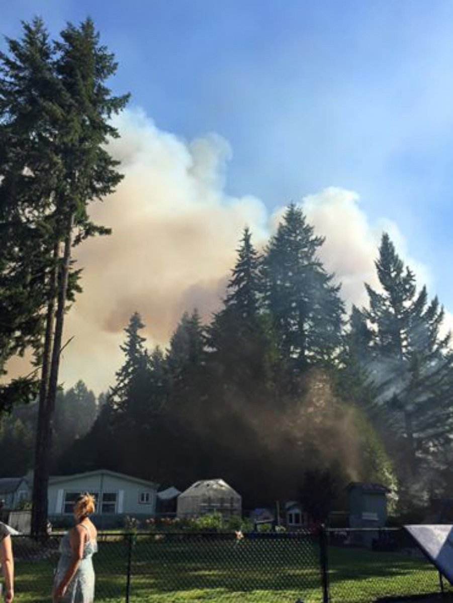 PHOTO: Nearly 70 wedding guests waited out a forest fire evacuation in Yelm, Washington, July 18, 2015. 