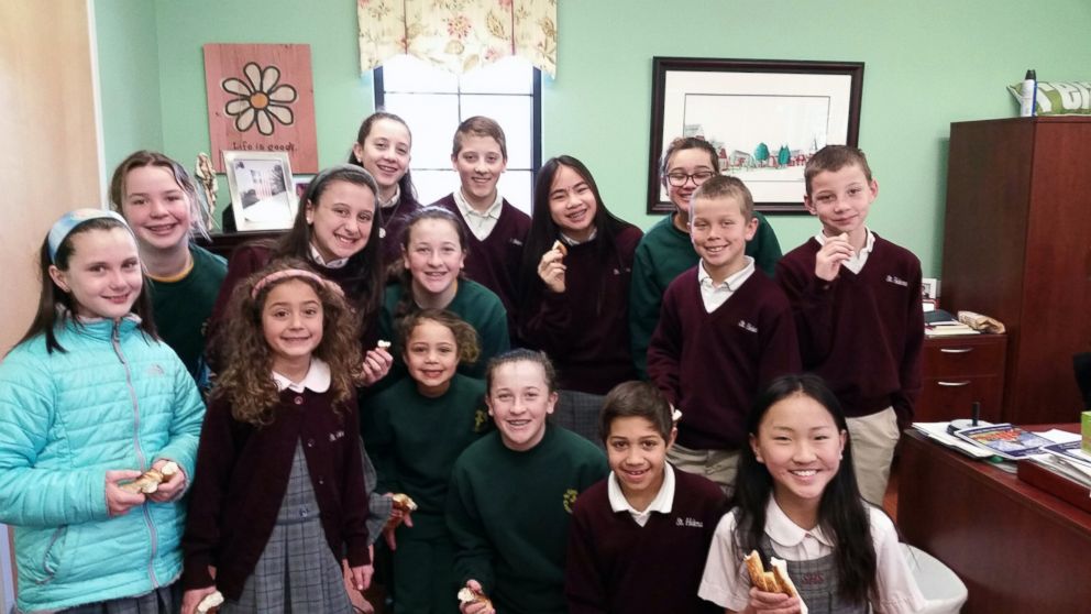 PHOTO: Saint Helena School students are shown after witnessing a school bus crash into a house in Blue Bell, Pennsylvania on March 24, 2015.