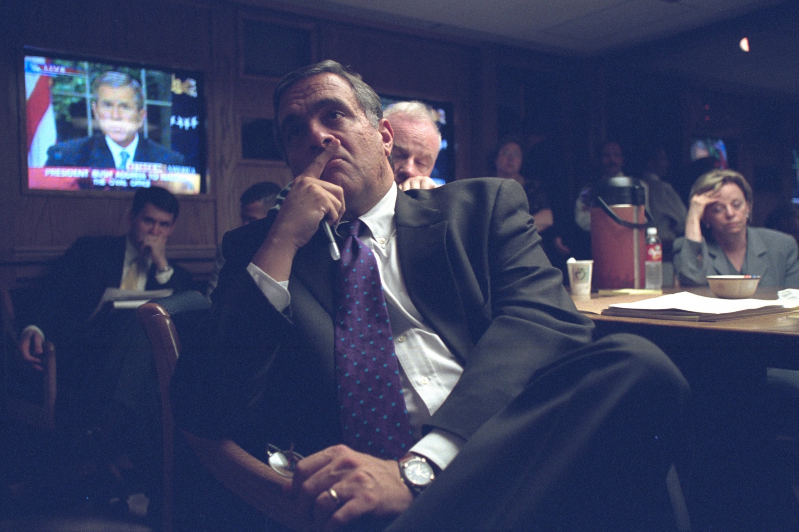 PHOTO: This photo released by the U.S. National Archives shows CIA Director George Tenet watching President Bush on TV on September 11, 2001.