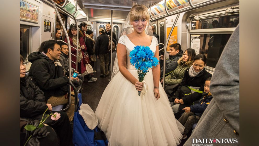 PHOTO: Hector Irakliotis and Tatyana Sandler celebrate their wedding on the N train