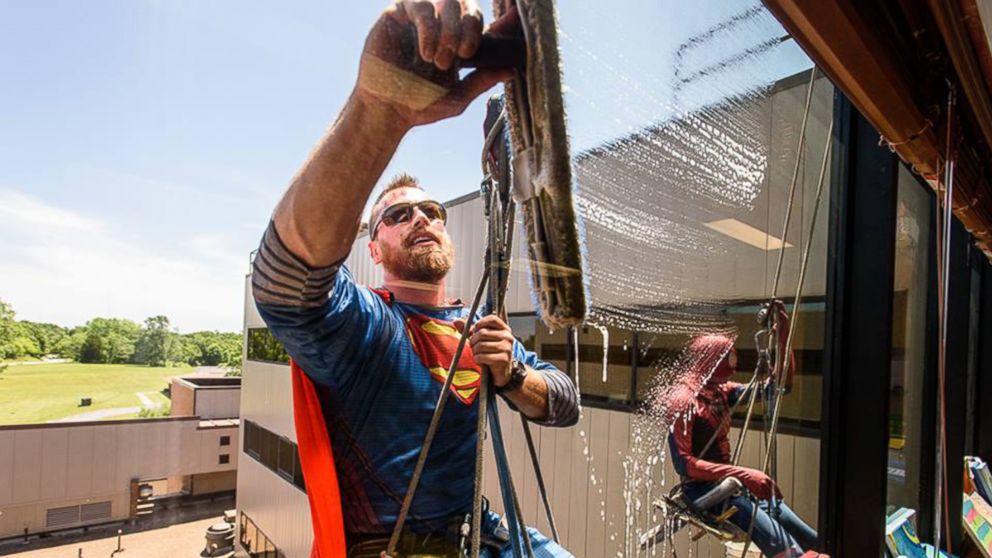 Window washers from Class Glass dressed as superheroes when they washed the windows of the University of Missouri Children's hospital, to the delight of the young patients. 