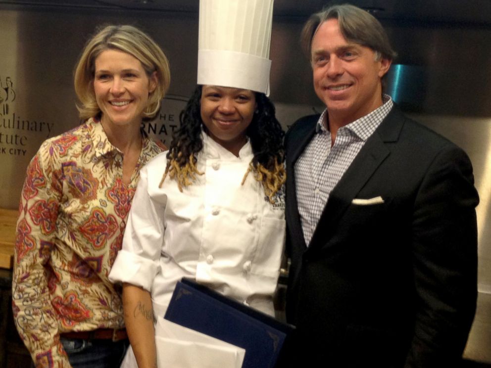PHOTO: Jessica Bride, co-founder of the Chef's Move! scholarship poses with John Besh and Syrena Johnson. 