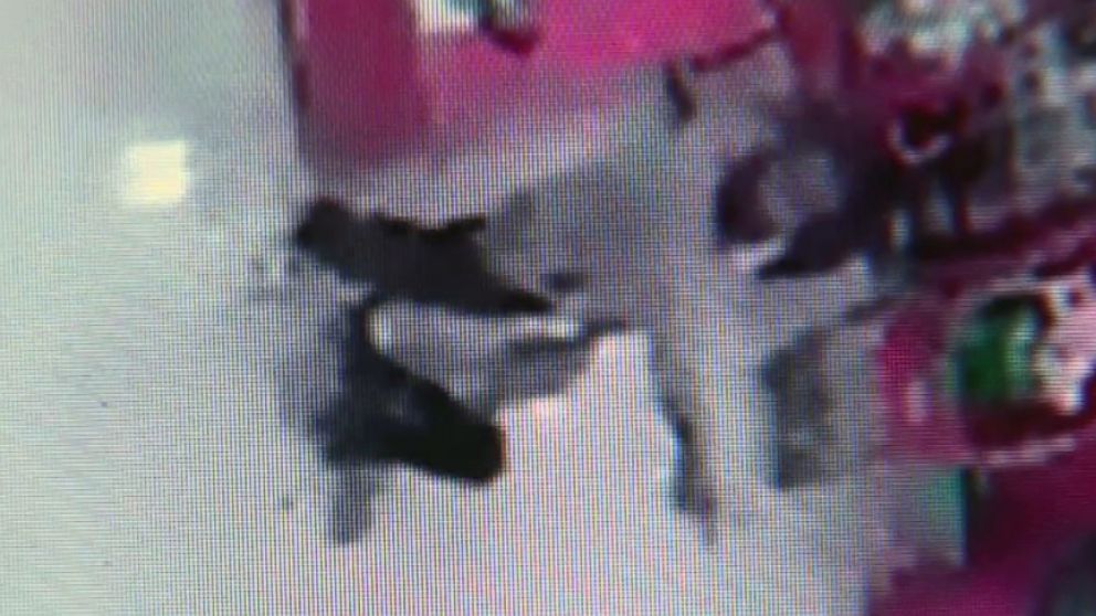 PHOTO: Surveillance footage from a Target in East Liberty, Pennsylvania shows a 2013 attack where Leon Walls grabbed a teenage girl from the checkout counter and threatened her with a knife. 
