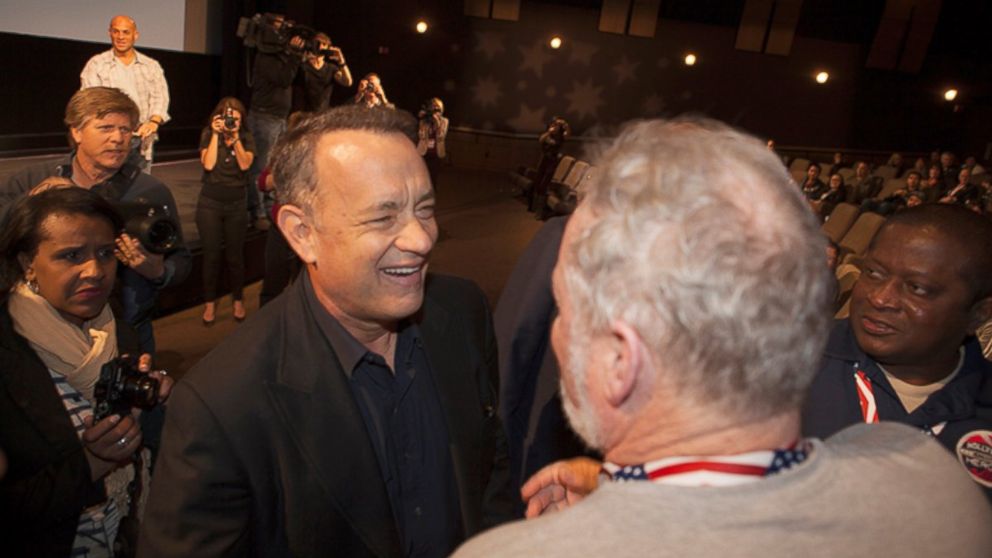 PHOTO: Tom Hanks greets wounded soldiers at a screening of "Forrest Gump" in Hollywood during a free trip set up by the Gary Sinise Foundation.