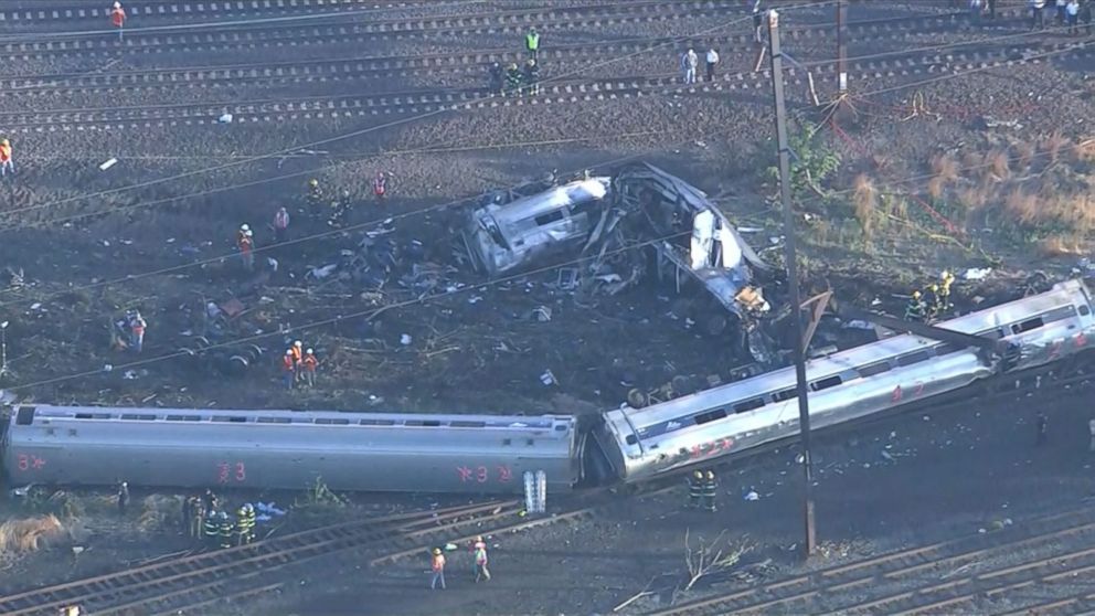 PHOTO: Emergency personnel work the scene of a deadly train wreck, May 13, 2015, in Philadelphia.