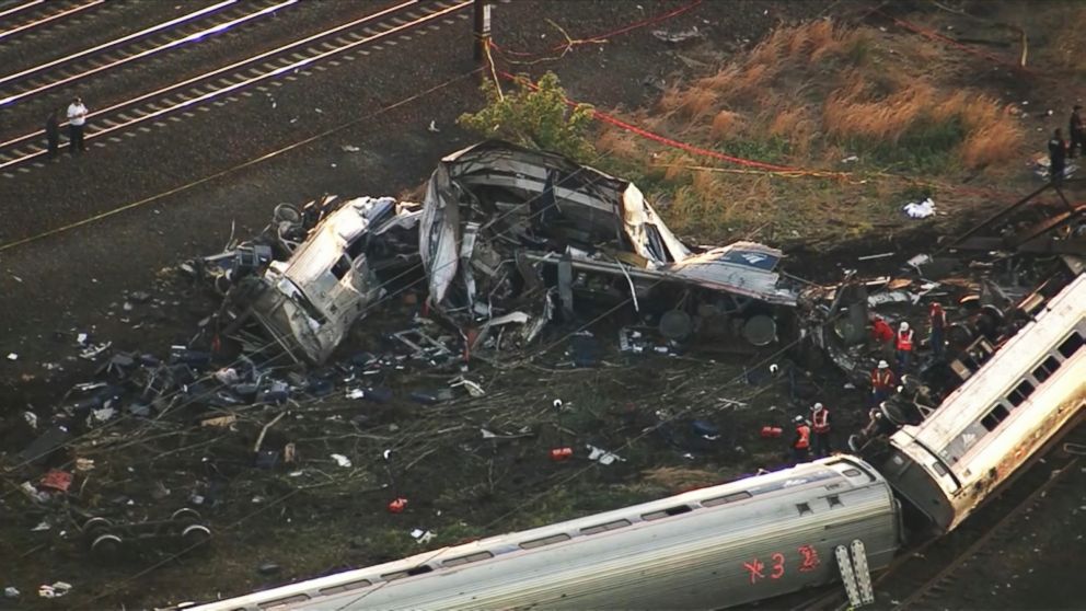 PHOTO: Emergency personnel work the scene of a deadly train wreck, May 13, 2015, in Philadelphia.