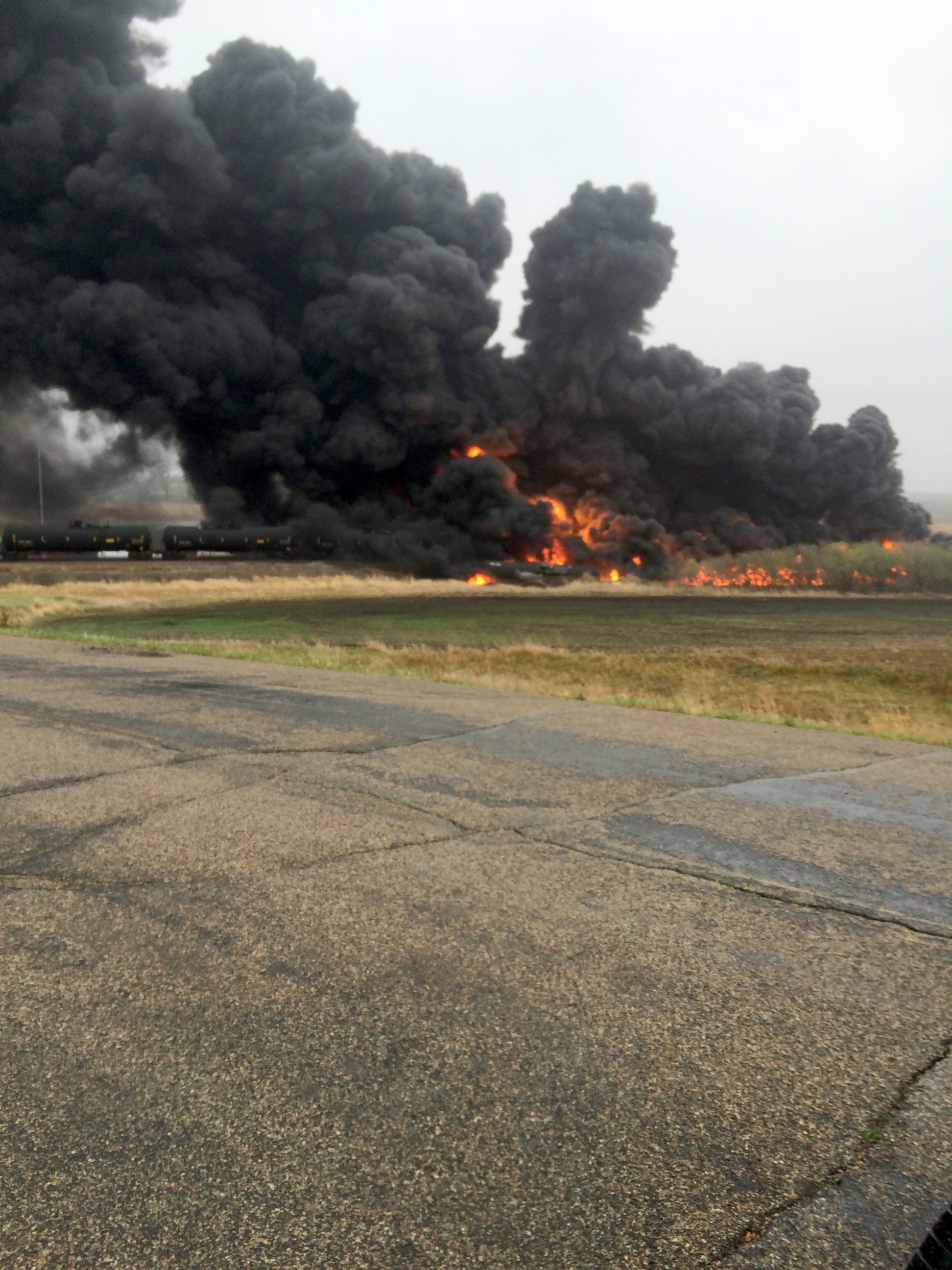 PHOTO: A 109-car Burlington Northern Santa Fe oil tanker train derailed and caught fire near a small town in North Dakota, May 6, 2015.