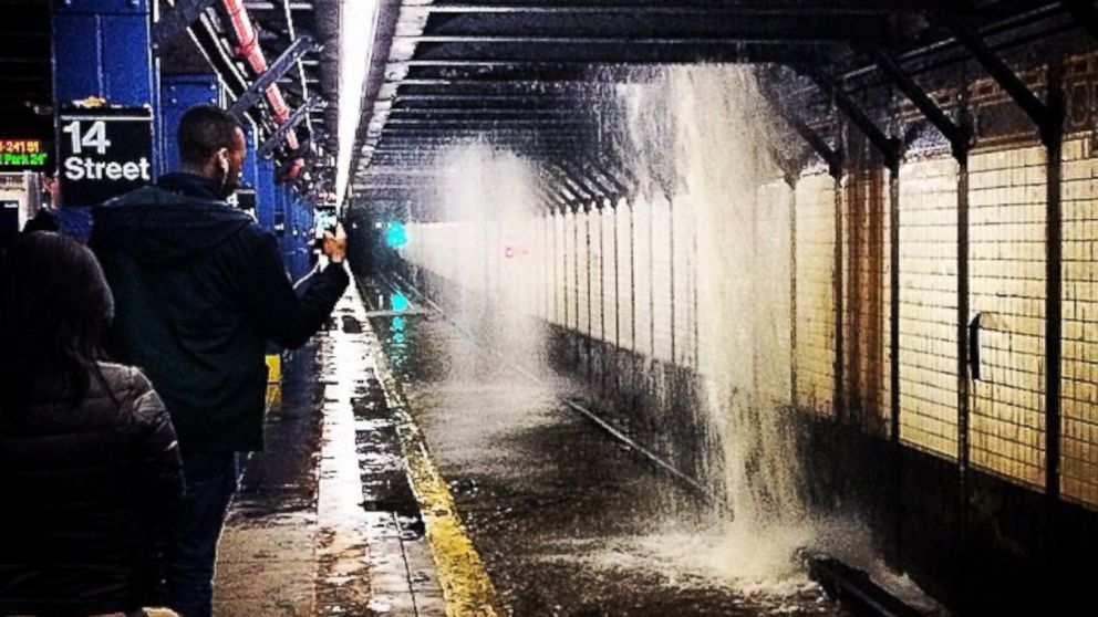PHOTO: A water main is broken at the 14th Street MTA train station, April 8, 2015, in New York City.