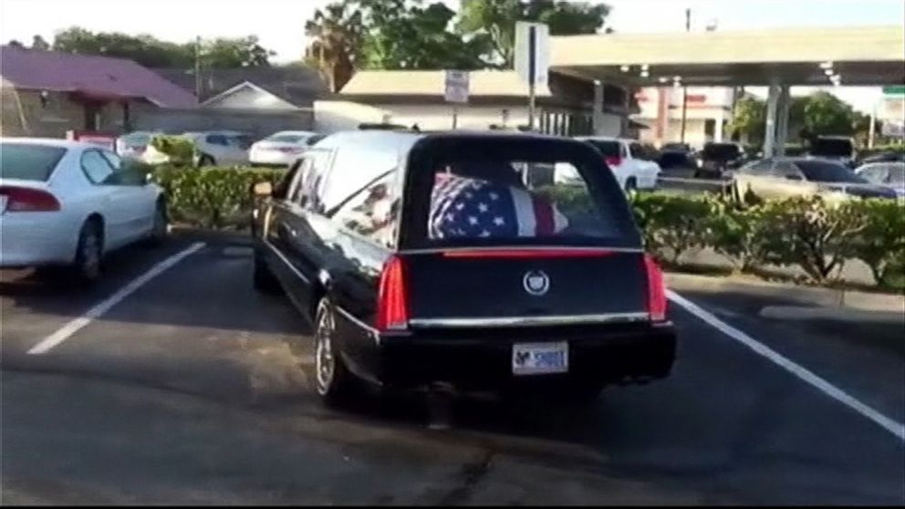 PHOTO: A hearse driver and funeral director have been fired after stopping for coffee on the way to a funeral.