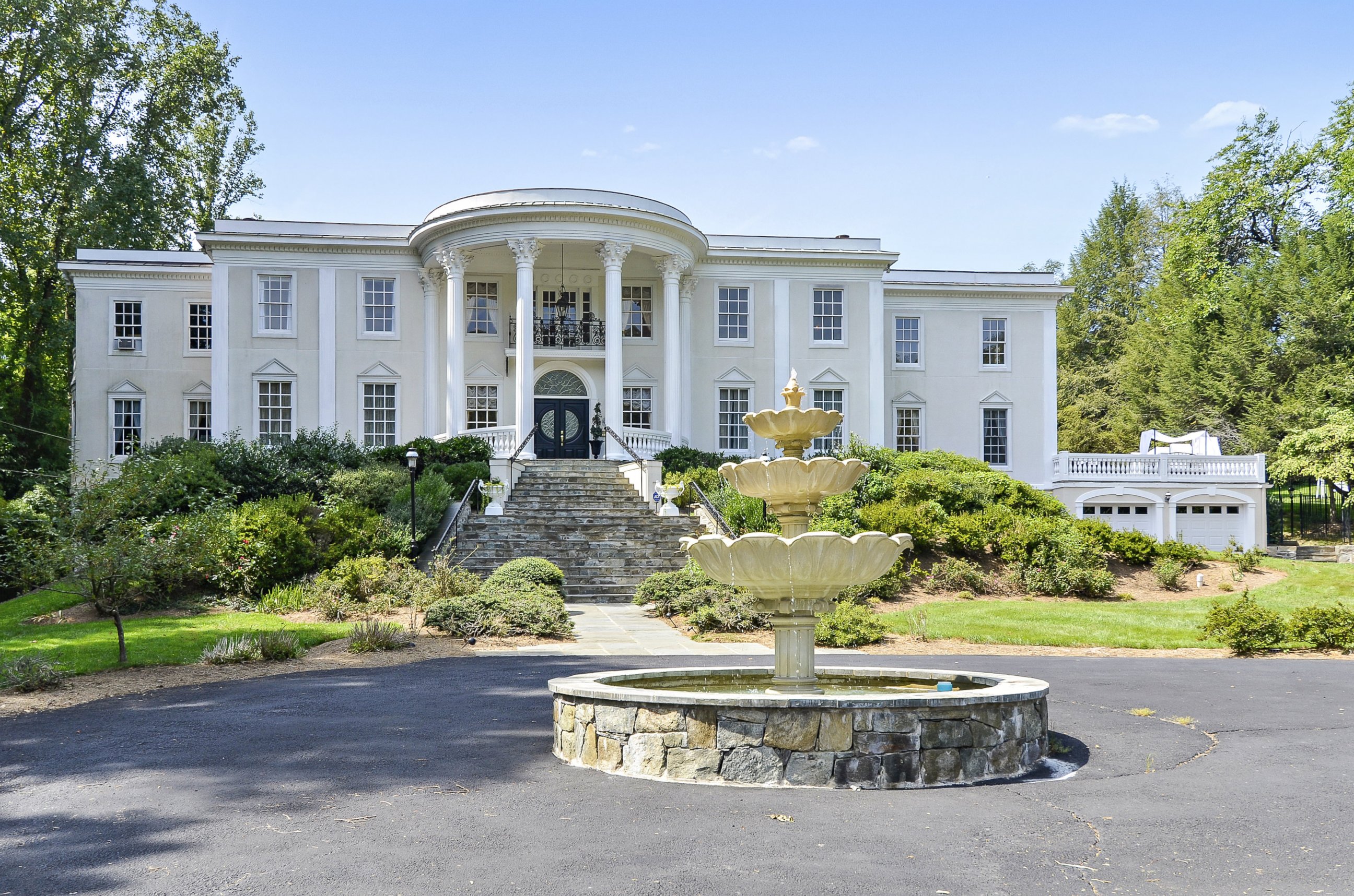 PHOTO: This house on Georgetown Pike features a curved portico and towering columns similar to the White House. 