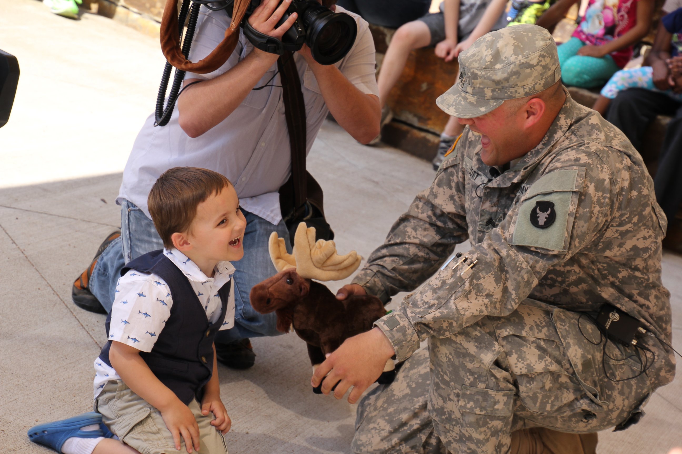 PHOTO: Sergeant Joseph Scott surprised his son, Evan, May 2, 2015,  at the Minnesota Zoo.