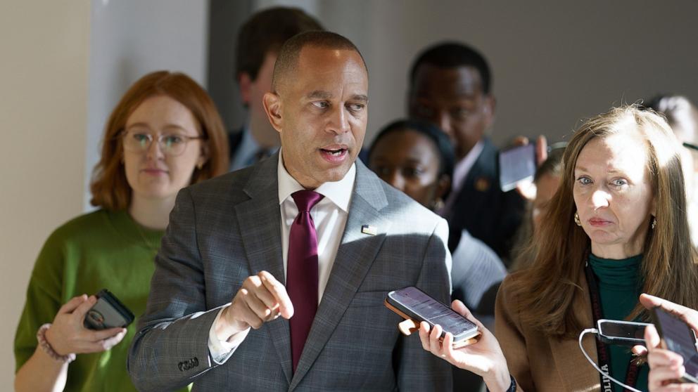 PHOTO: House Minority Leader Hakeem Jeffries speaks to journalists following a press conference at the U.S. Capitol, Washington, Dec. 19, 2024.