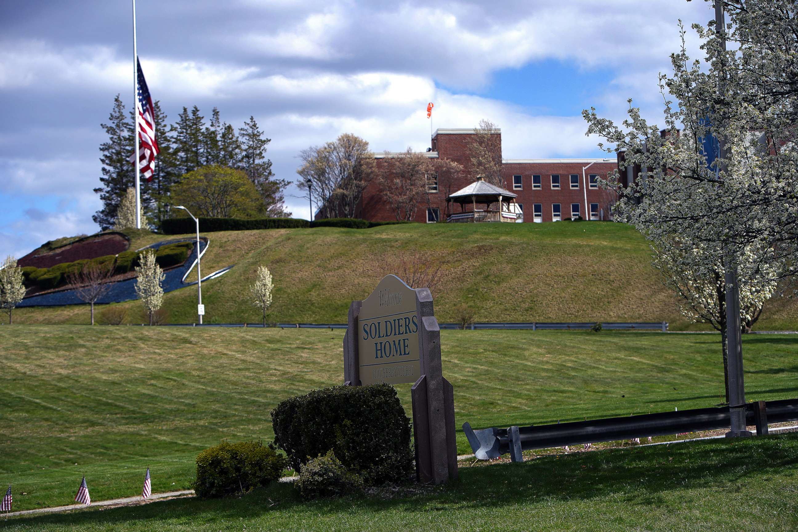 PHOTO: A flag hangs at half mast on the grounds of the Holyoke Soldiers Home in Holyoke, Mass. on April 28, 2020.