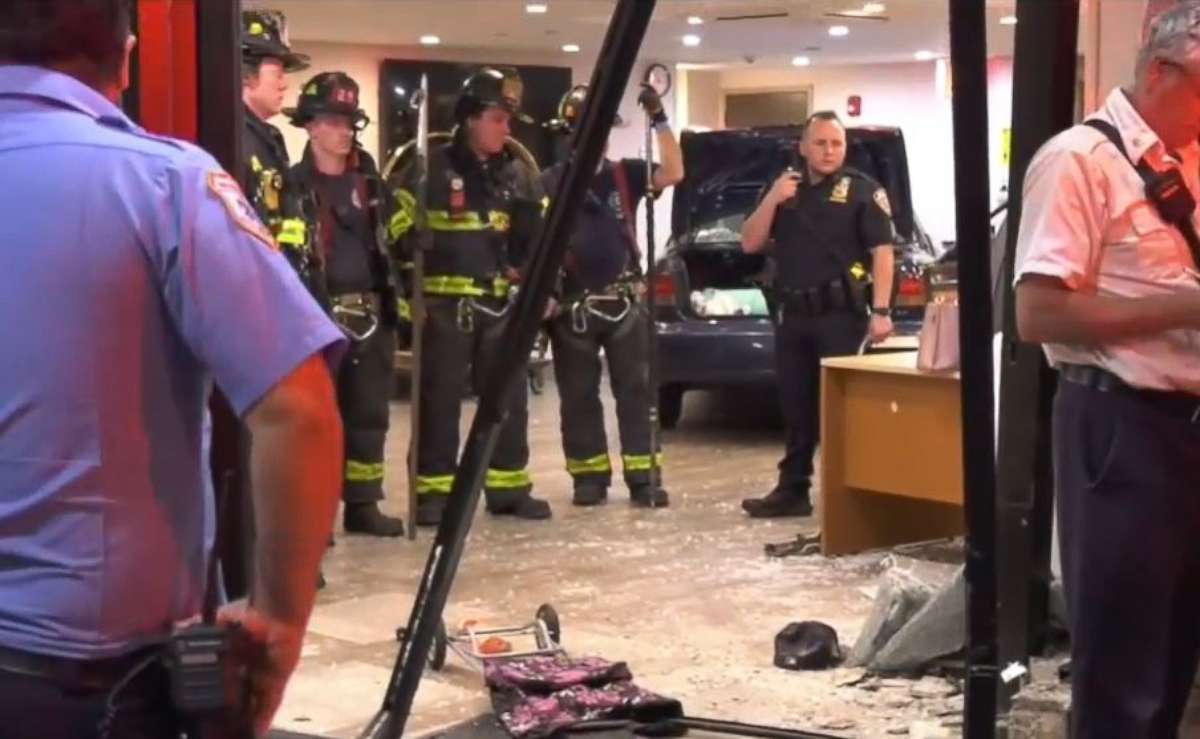 PHOTO: A woman is on the run from the police after driving a car through the lobby of a hotel-turned-homeless shelter in New York City on July 12, 2021.