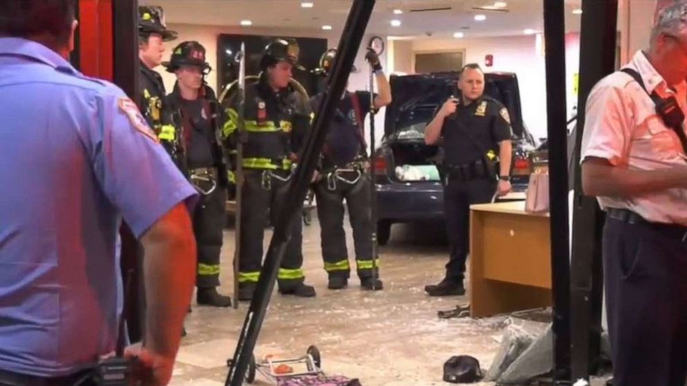 Woman at large after plowing car through hotel-turned-homeless shelter, 3 injured